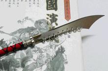 历史上将大刀背上装上很多铁环是干什么用的？