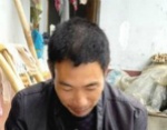 重庆农民家门前挖出大量化石 专家:这是剑齿虎