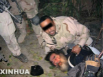 萨达姆被判死刑后作“绝笔诗”《解脱》都写了什么?
