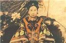 慈禧太后出土后嘴角为何被划开一个大口子?